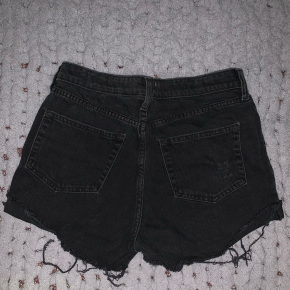 Black distressed jean shorts with holes. - Picture 2 of 3